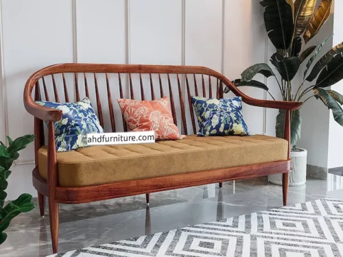 Alankar Sofa set in teak wood, sleek curved design, grill work on back side, solid legs, suede fabric