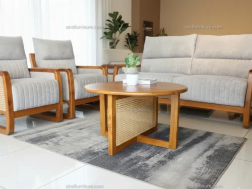 Round teak wood coffee table with woven cane panel on base