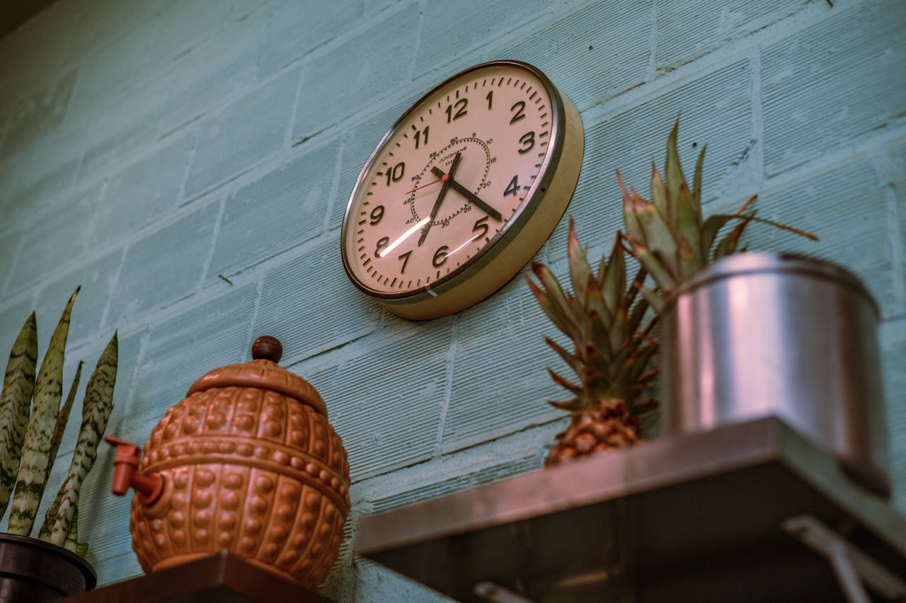 Where to hang the wall clock in the living room as per Vastu