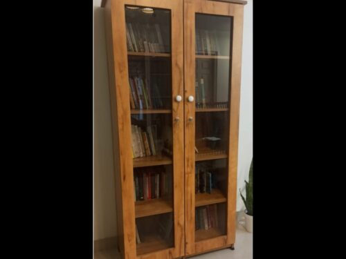 bookshelf, engineering wood, wooden finish, glass on front side