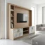 Bennett TV unit: Modern media wall console with light wood grain, white marble-effect doors, and rose gold accents for a living room