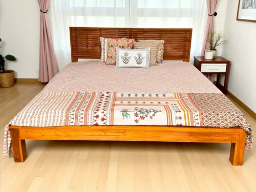 King size teak wood cot with slatted headboard, handcrafted from polished Kerala teak in a minimalist design